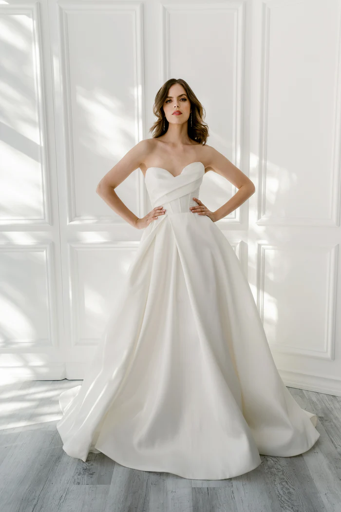 Strapless Ball Gown Wedding Dress With A Corset Bodice, Front Slit And Back  Bow